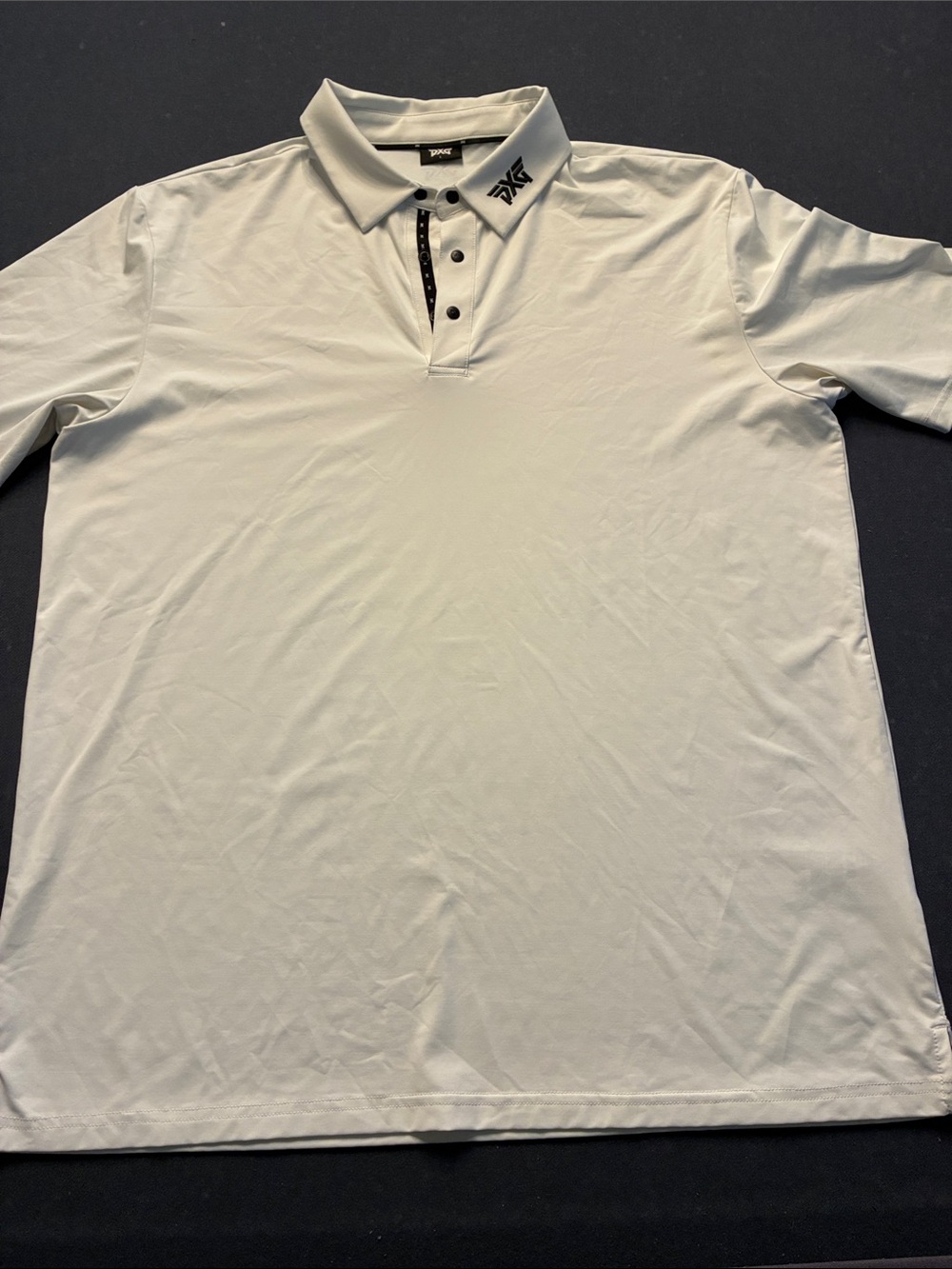 PXG Men’s White Polo with Black Accent Logo